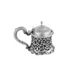 A Victorian sterling silver mustard pot, London 1844 by George Frederick Pinnell