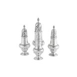 A set of three George III sterling silver casters, London 1765 by John Delmester