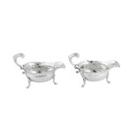 A pair of George II sterling silver sauce boats, London 1748 by John Pollock (this mark reg. 26th Ju