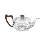 An Edwardian sterling silver teapot, London 1904 by Samuel Walton Smith and Co