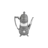 A Victorian Scottish sterling silver 'Burmese pattern' coffee pot, Edinburgh 1876 by Edwin Millidge