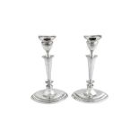 A pair of Edwardian Scottish sterling silver candlesticks, Edinburgh 1906 by Hamilton and Inches