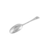 A George II sterling silver tablespoon, London 1741, makers mark obscured possibly for Thomas Jackso