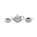 An early 20th century Chinese Export silver three-piece tea service, Shanghai circa 1920 retailed by