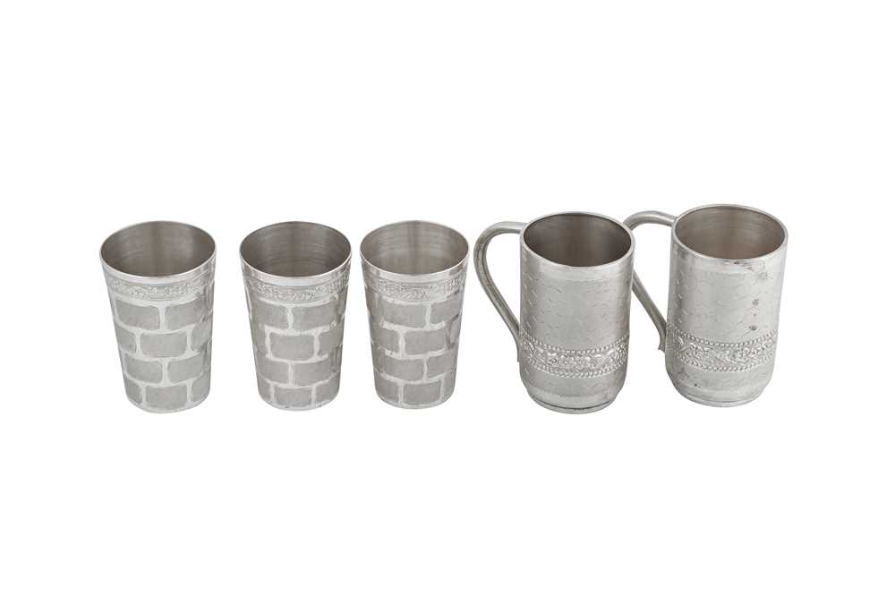 A pair of 20th century modern Indian silver mugs