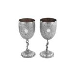 A pair of late 19th century Anglo - Indian unmarked silver goblets, Lucknow circa 1890