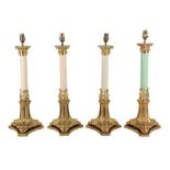 A SET OF FOUR BAROQUE STYLE ORMOLU TABLE LAMPS