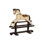AN EARLY 20TH CENTURY CHILD'S ROCKING HORSE OF SMALL PROPORTIONS