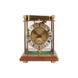 A THWAITES & REED ROLLING BALL CLOCK