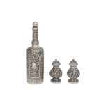 AN INDIAN SILVER TWO-PIECE CRUET SET AND A SCENT BOTTLE Kutch, Gujarat, West India, late 19th centur