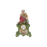 AN ORIENTALIST PORCELAIN MANTEL CLOCK WITH A RESTING TURK Possibly France, mid to late 19th century