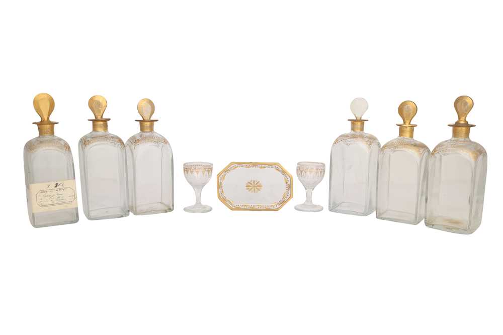 A PORTABLE DRINKING SET WITH GILT GLASS DECANTERS AND SPIRIT GLASSES England, mid to late 19th centu
