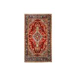 AN EXTREMELY FINE SIGNED SILK HEREKE RUG, TURKEY