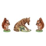 A PAIR OF STAFFORDSHIRE CREAMWARE SQUIRRELS, RALPH WOOD TYPE