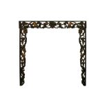 AN EAST ASIAN CARVED, EBONISED AND PARCEL GILT WOOD ARCH, EARLY 20TH CENTURY