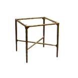 A CONTEMPORARY BRASS EFFECT HAMMERED IRON COFFEE TABLE BASE