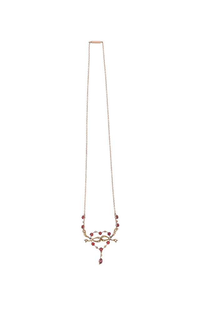 A GARNET AND SEED PEARL NECKLACE