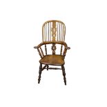 A LATE 19TH CENTURY YEW AND ELM WINDSOR ARMCHAIR