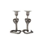 A pair of mid-20th century Indian unmarked silver candlesticks, circa 1960