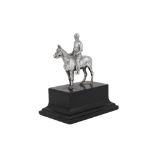 A George V sterling silver model of a jockey on horseback, London 1913