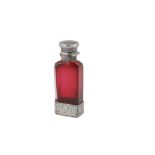 A Victorian sterling silver mounted ruby glass scent bottle combination vinaigrette, Birmingham 1877