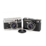 A Black & a Chrome Olympus 35 EC2 Compact Camera.
