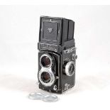 A Rolleiflex T 120 TLR Camera.