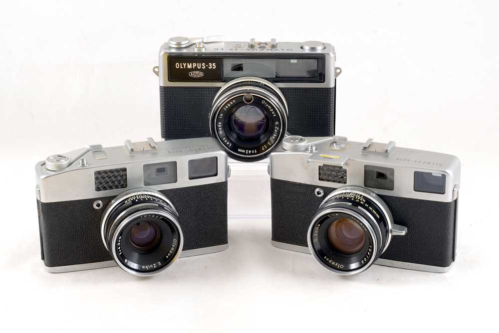 Group of Three Olympus Rangefinder Cameras.