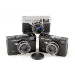 Two Black & a Chrome Olympus 35EC Compact Film Cameras.