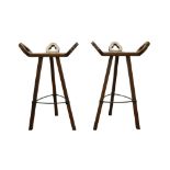 AFTER SERGIO RODRIGUES (BRAZILIAN 1927 - 2014): A PAIR OF 'MARBELLA' STYLE OAK BAR STOOLS