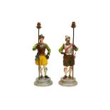 A PAIR OF PAINTED SPELTER TABLE LAMPS IN THE FORM OF PIKEMEN