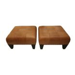 A PAIR OF CONTEMPORARY TUFTED TAN LEATHER OTTOMAN STOOLS