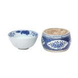 A CHINESE BLUE AND WHITE BOWL AND AN INKSTONE