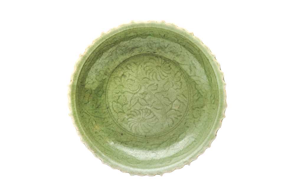 A CHINESE CELADON-GLAZED 'BLOSSOMS' CHARGER