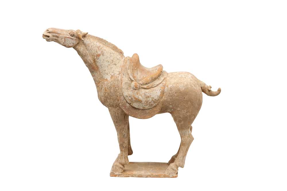 A CHINESE POTTERY MODEL OF A HORSE