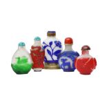 A GROUP OF FIVE CHINESE OVERLAY GLASS SNUFF BOTTLES