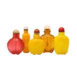 A GROUP OF FIVE CHINESE BEIJING GLASS SNUFF BOTTLES.