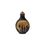 λ A CHINESE HORN GILT-DECORATED 'HORSE' SNUFF BOTTLE _