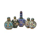 A GROUP OF FOUR CHINESE CLOISONNÉ ENAMEL SNUFF BOTTLES