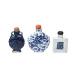 A GROUP OF THREE CHINESE BLUE AND WHITE SNUFF BOTTLES