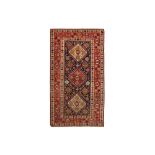 AN ANTIQUE QASHQAI LARGE RUG, SOUTH-WEST PERSIA