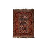 AN ANTIQUE BALOUCH RUG, NORTH-EAST PERSIA