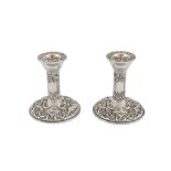 A PAIR OF ELIZABETH II STERLING SILVER DWARF CANDLESTICKS BY WI BROADWAY & CO, BIRMINGHAM 1976