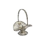 A GEORGE V STERLING SILVER SWING HANDLED FRUIT BASKET, LONDON 1912 BY HARRODS