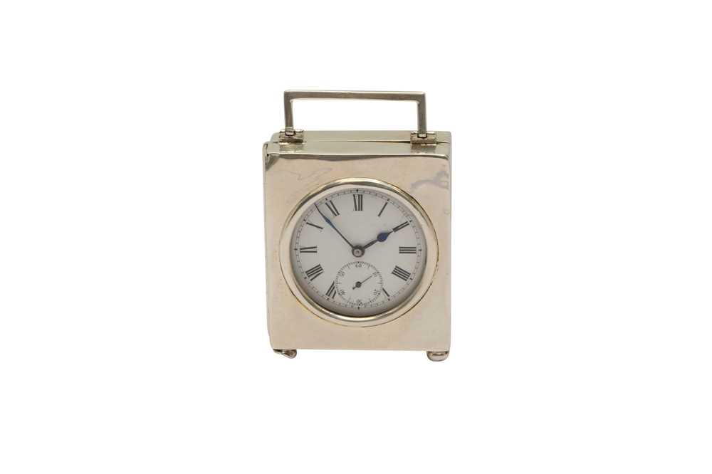 A GEORGE V STERLING SILVER CASED TRAVELLING TIMEPIECE OR CLOCK, LONDON 1910 BY J C VICKERY