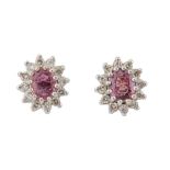 A PAIR OF PINK SAPPHIRE AND DIAMOND EARSTUDS
