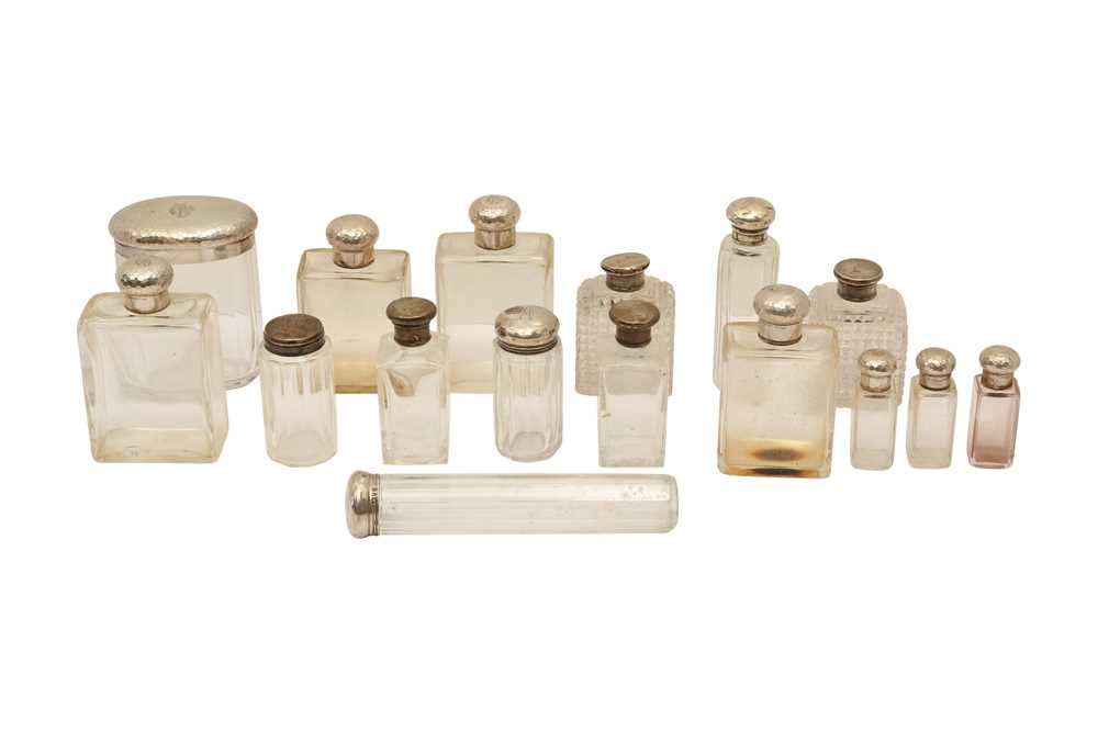 A MIXED GROUP OF GERMAN 800 STANDARD SILVER MOUNTED SCENT BOTTLES AND DRESSING TABLE BOTTLES