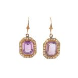 A PAIR OF AMETHYST AND HALF-PEARL EARRINGS