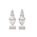 A pair of George III sterling silver peppers, London 1810 by Solomon Hougham