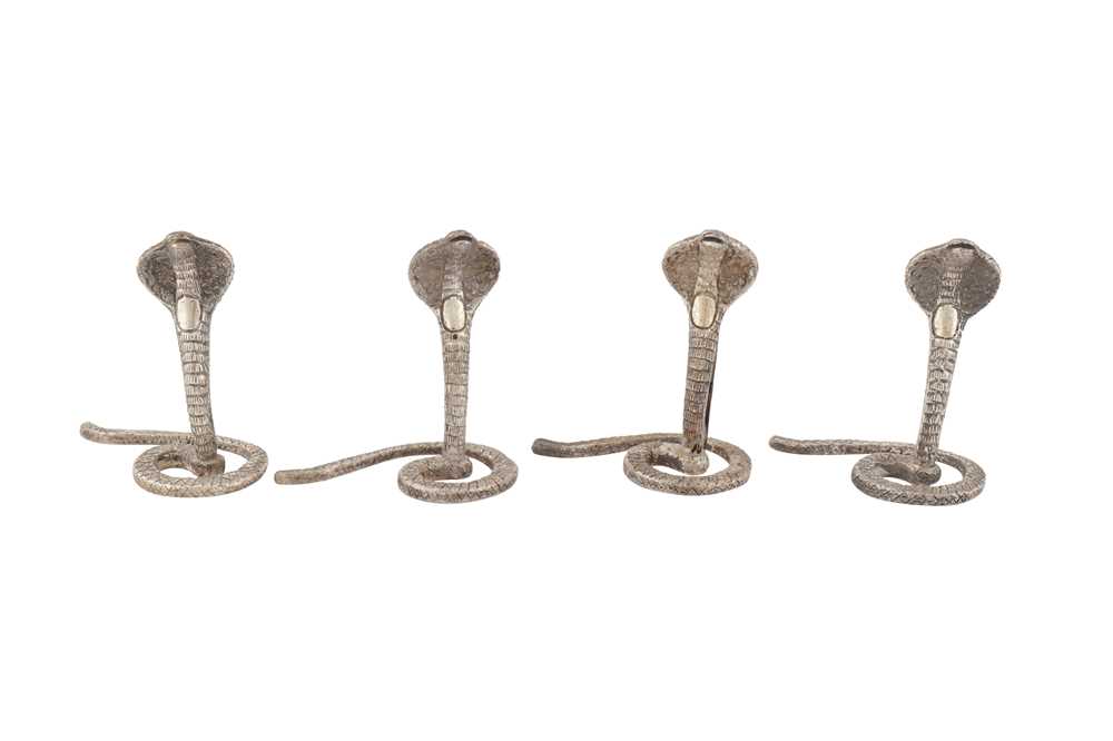 FOUR MID-20TH CENTURY INDIAN SILVER PLACE CARD OR MENU HOLDERS